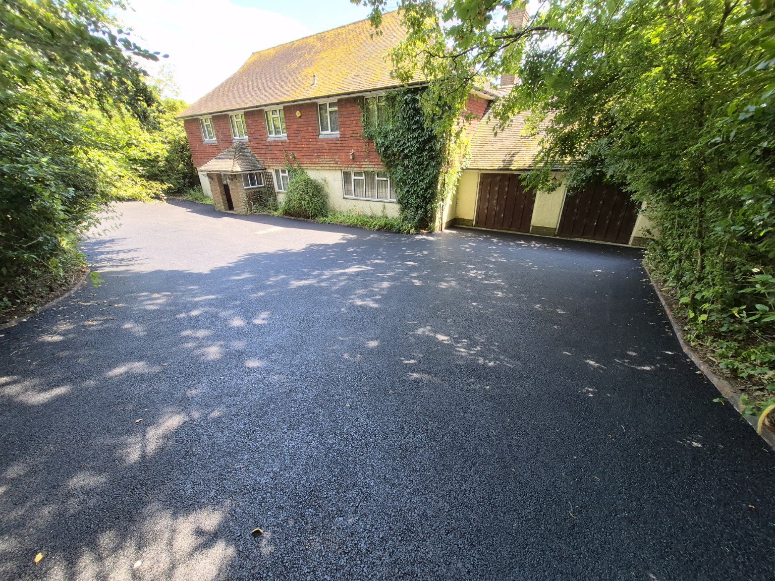 Completed residential tarmac driveway